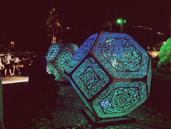 Illuminated christmas tree at night