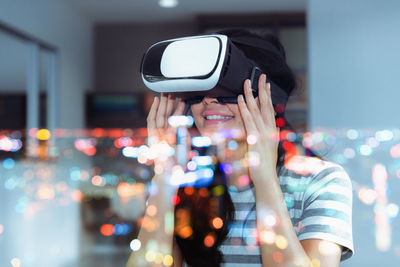 Woman using virtual reality glasses