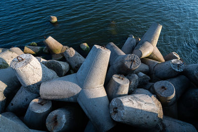 High angle view of pebbles on shore