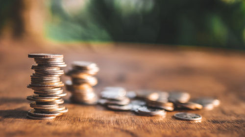 Close-up of coins on table