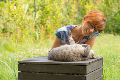 Cat relaxing on grass