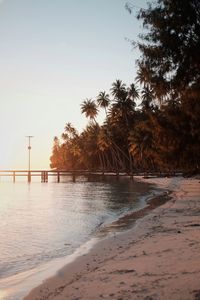 Scenic view of swimming pool against sky during sunset
