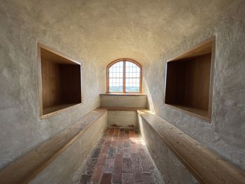 Empty corridor of medieval castle tower 