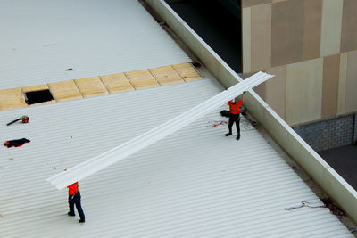 High angle view of people walking on street