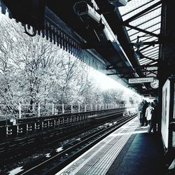 People at railroad station platform