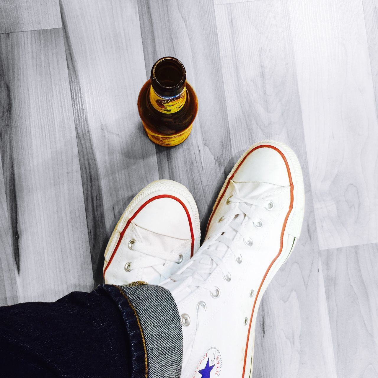 shoe, indoors, high angle view, low section, footwear, still life, pair, person, close-up, personal perspective, directly above, fashion, table, bottle, flooring, floor, shadow, white color, personal accessory, human foot