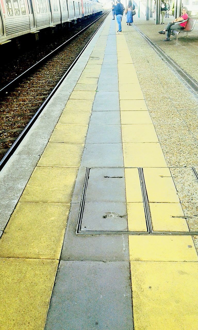 TRAIN AT RAILROAD STATION PLATFORM