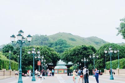 People at town square against clear sky