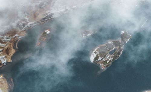 Aerial view of rock formation in sea