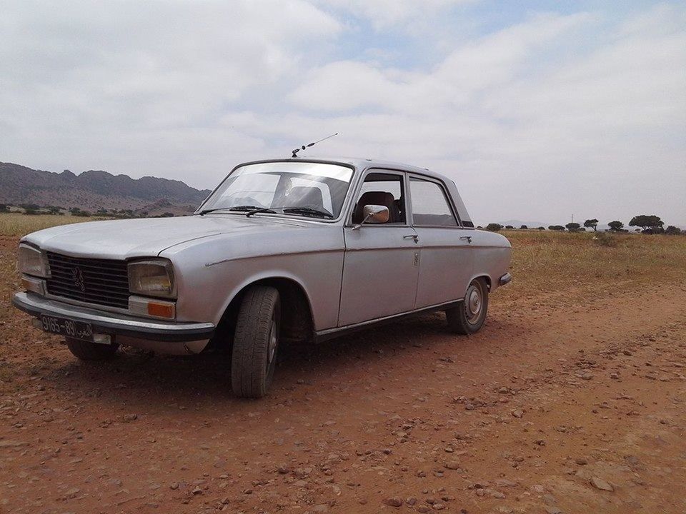 ABANDONED CAR ON ROAD