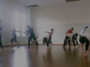 People dancing in corridor