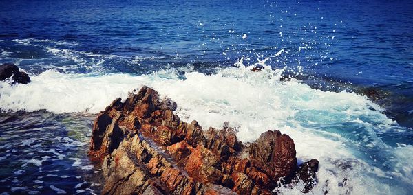 View of rocks in sea