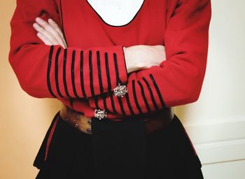 Close-up of woman holding red umbrella