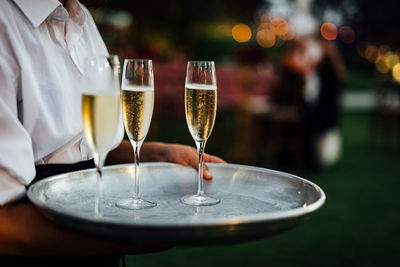 Luxury wine and champagne  for fine dining with and glassware, beautiful blurred  background. 