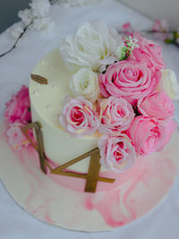 Close-up of wedding rings on table