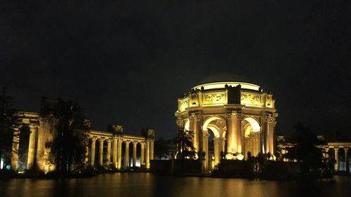 Low angle view of illuminated building at night