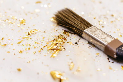 High angle view of paintbrushes on table