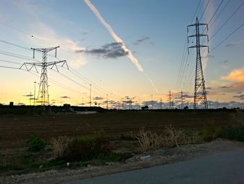 Electricity pylons on road