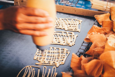 High angle view of man preparing food