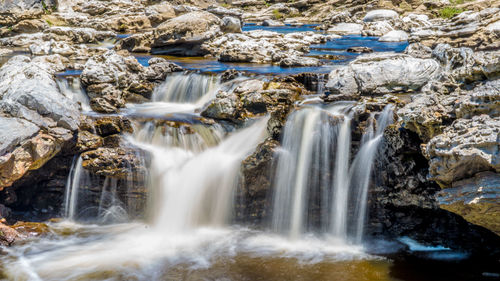 Water flowing through rocks