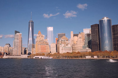 Modern buildings in city against sky