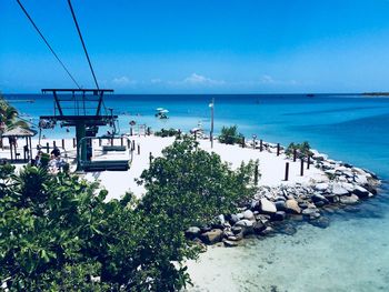 Scenic view of sea against clear blue sky