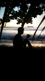 Silhouette of people on beach