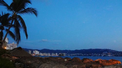 Scenic view of calm sea against blue sky