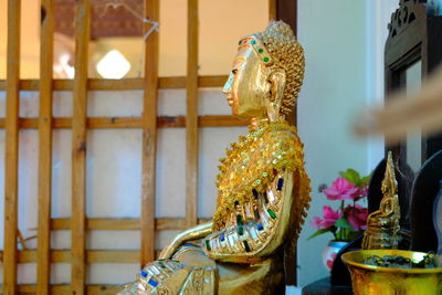 Close-up of statue against temple