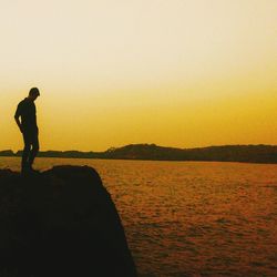 Silhouette of people at sunset