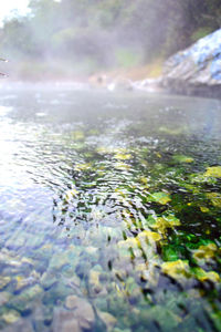 Surface level of water flowing in sunlight