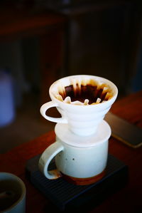 High angle view of coffee cup on table