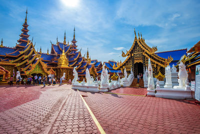 Temple outside building against sky