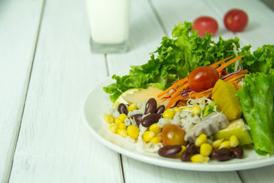 Close-up of fruits in plate on table