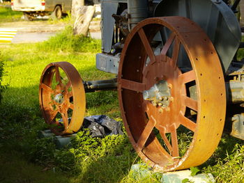 Close-up of vintage wheel on field