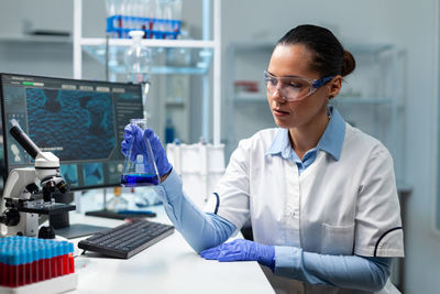 Young scientist working at laboratory