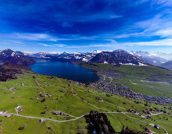Scenic view of landscape and mountains against sky