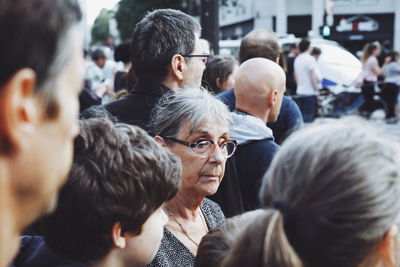 Group of people looking at city street