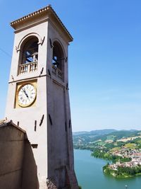 Low angle view of clock tower against sky