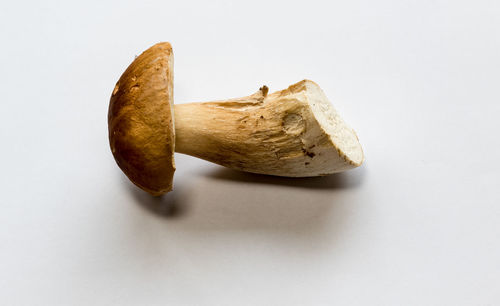 Close-up of fruit over white background