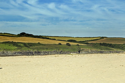 Scenic view of land against sky