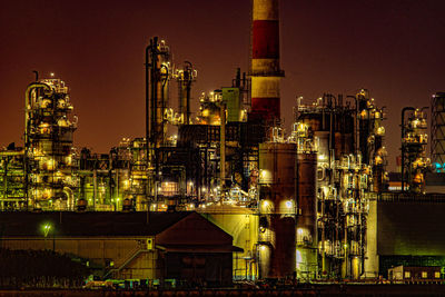 Illuminated buildings in city at night