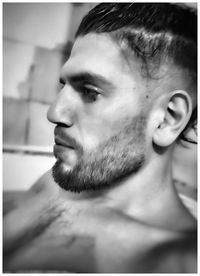 Portrait of young man looking away