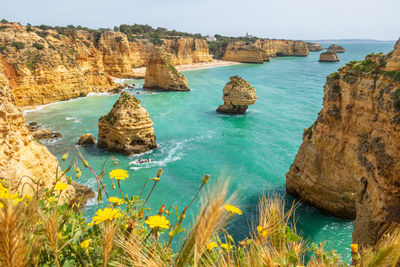 Cliffs and ocean near praia da marinha near benagil, algarve, portugal