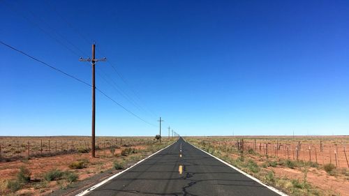View of road against blue sky