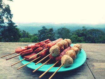 Close-up of meat on barbecue grill