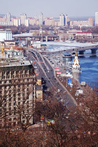 Kiev in the spring, view at the quay, the bridge in the background at the stage of construction