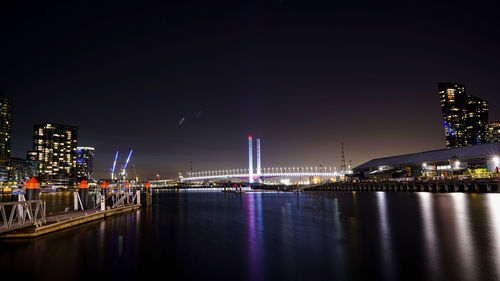 Illuminated buildings at waterfront