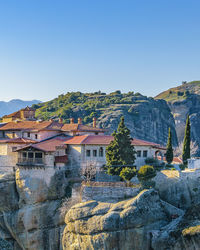 High angle view of townscape against clear blue sky