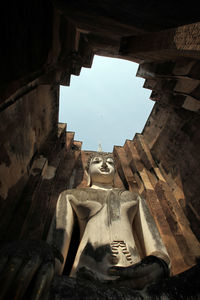 Low angle view of statue of historic building